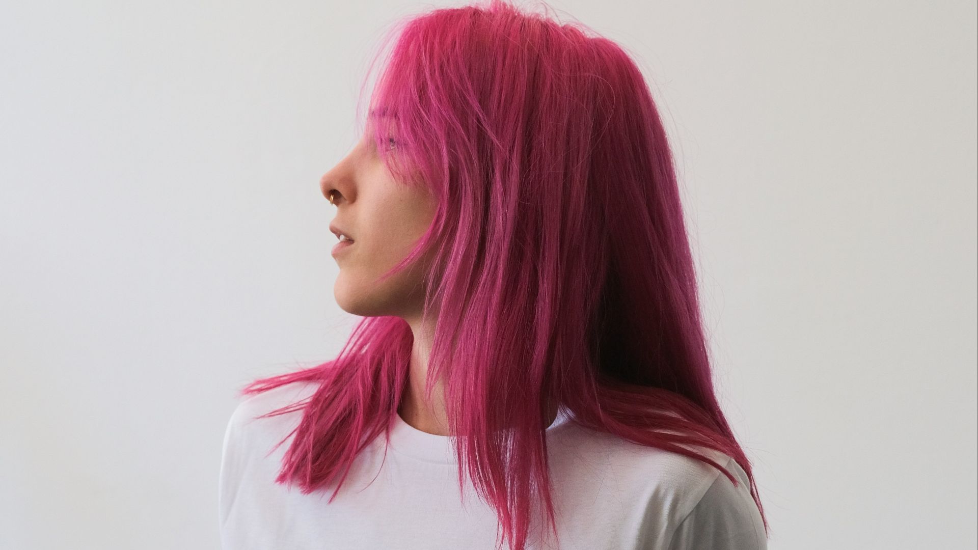 a man with pink hair