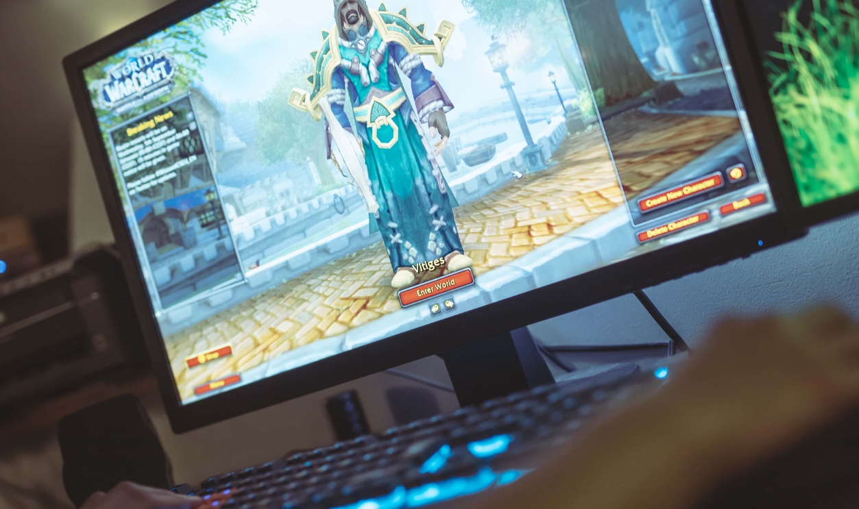Woman Playing World Of Warcraft, Shutterstock, 1185697651