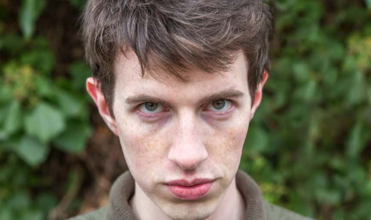 A Young Man Looks Menacing, Shutterstock, 1908072259