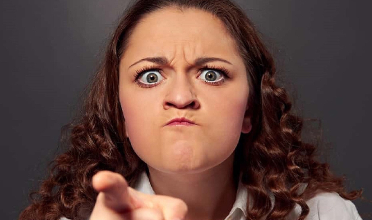 Angry Young Woman Pointing At Camera , Shutterstock, 127064702