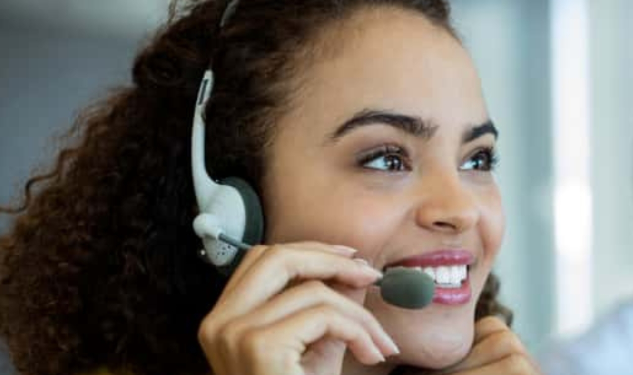 Customer Service Executive Working At Office, Shutterstock, 631086410