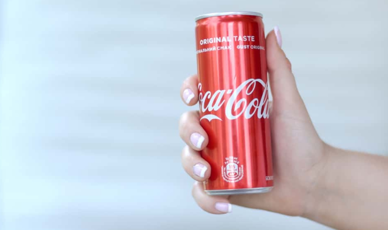 Female Hand Holds Red Coca-Cola Tin, Shutterstock, 1474521824