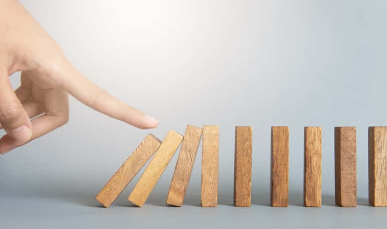 Hand Stop A Dominoes Continuous Toppled, Shutterstock, 1155213262