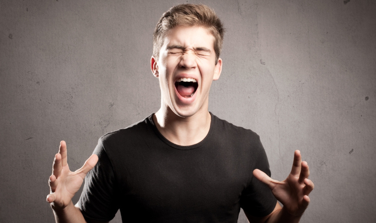 Young Man Screaming On A Grey Background, Shutterstock, 162844970