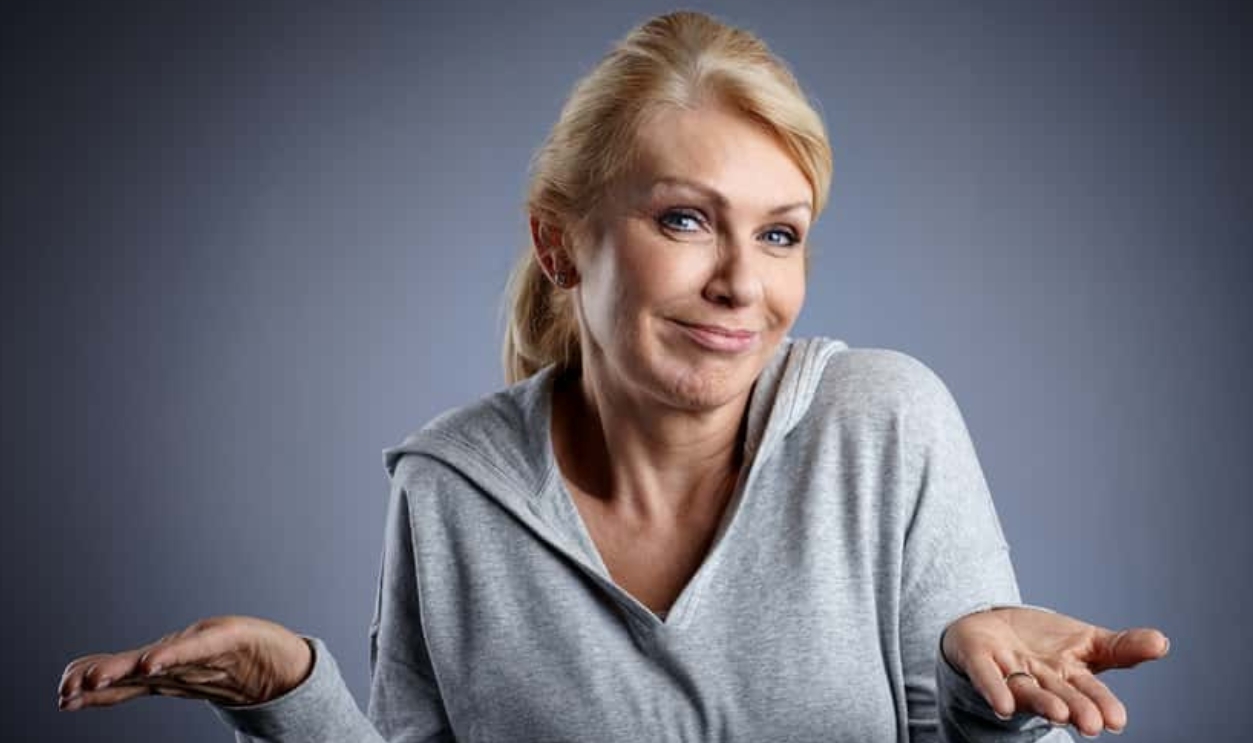 Mature Woman Shrugging, Shutterstock, 258332315