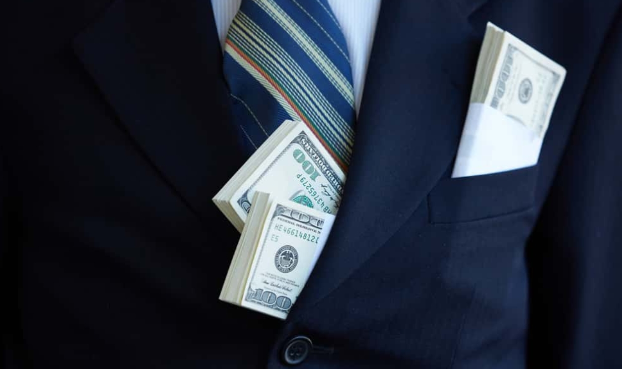 Money In The Pocket Of A Businessman, Shutterstock, 645099265