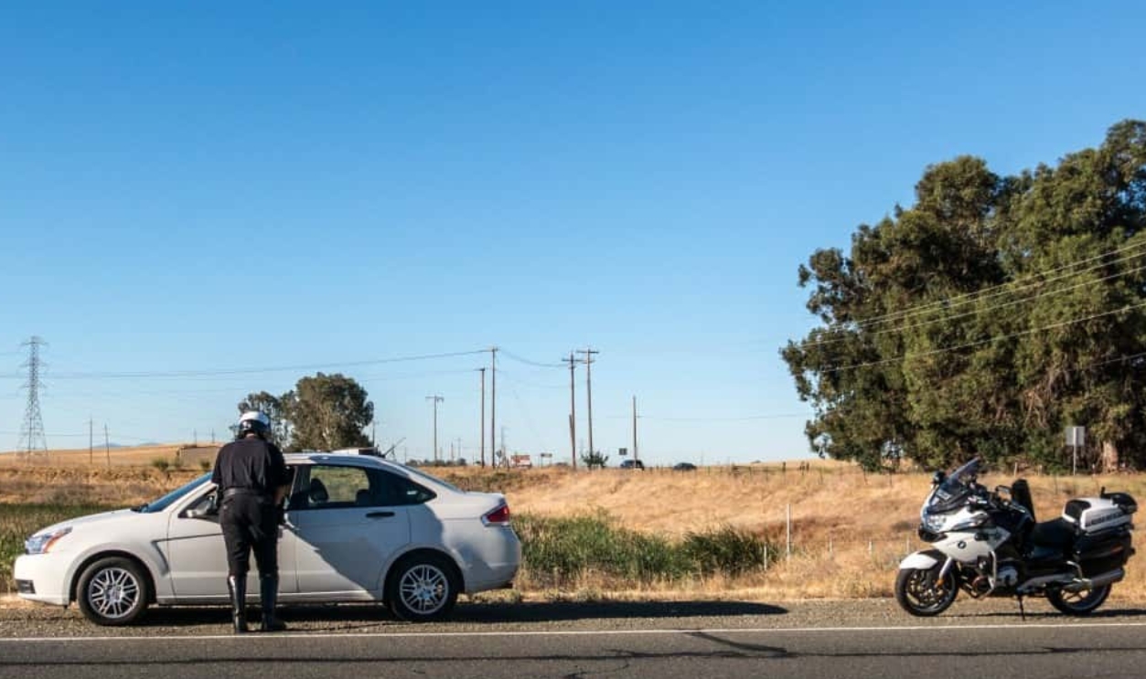 Police Officer Traffic Stop Motorcycle Highway