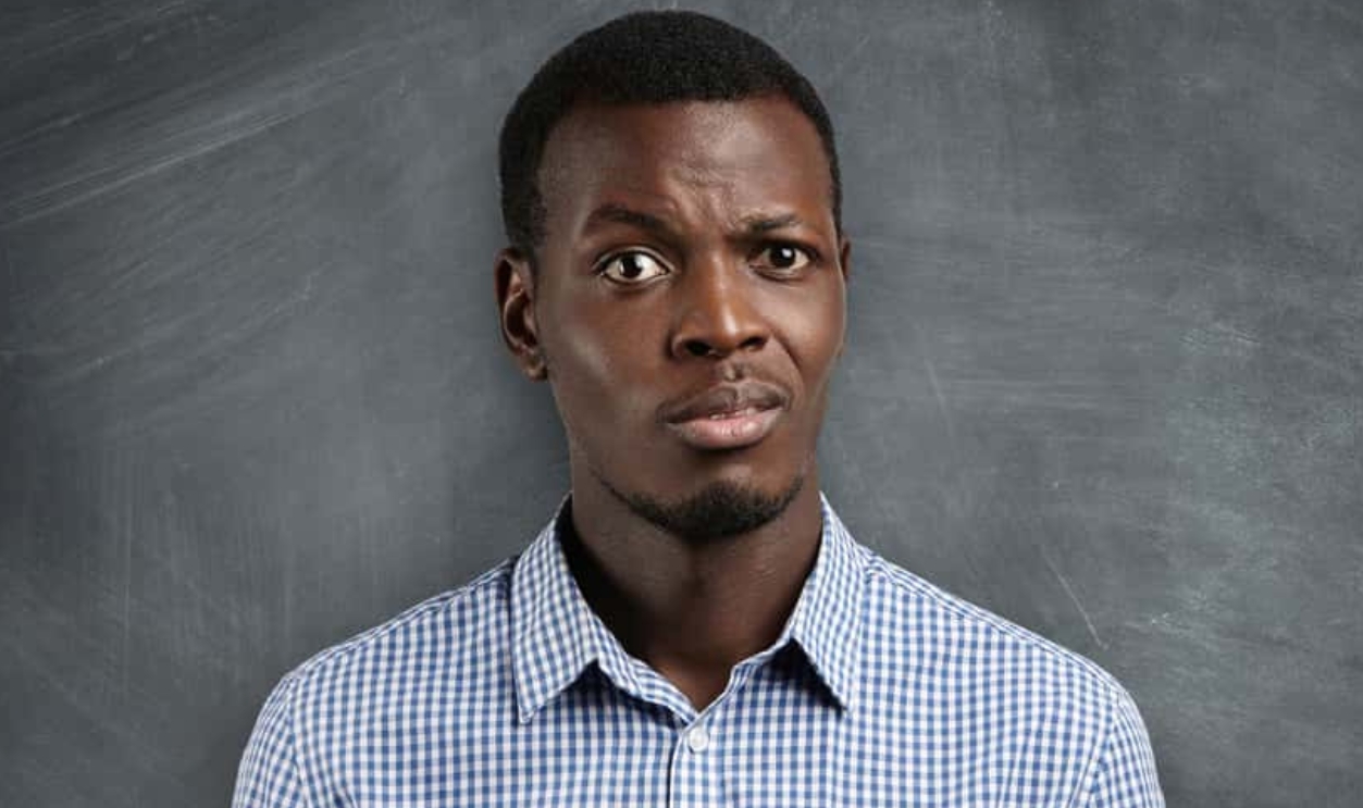 Shocked Dark-Skinned Teacher, Shutterstock, 499471111