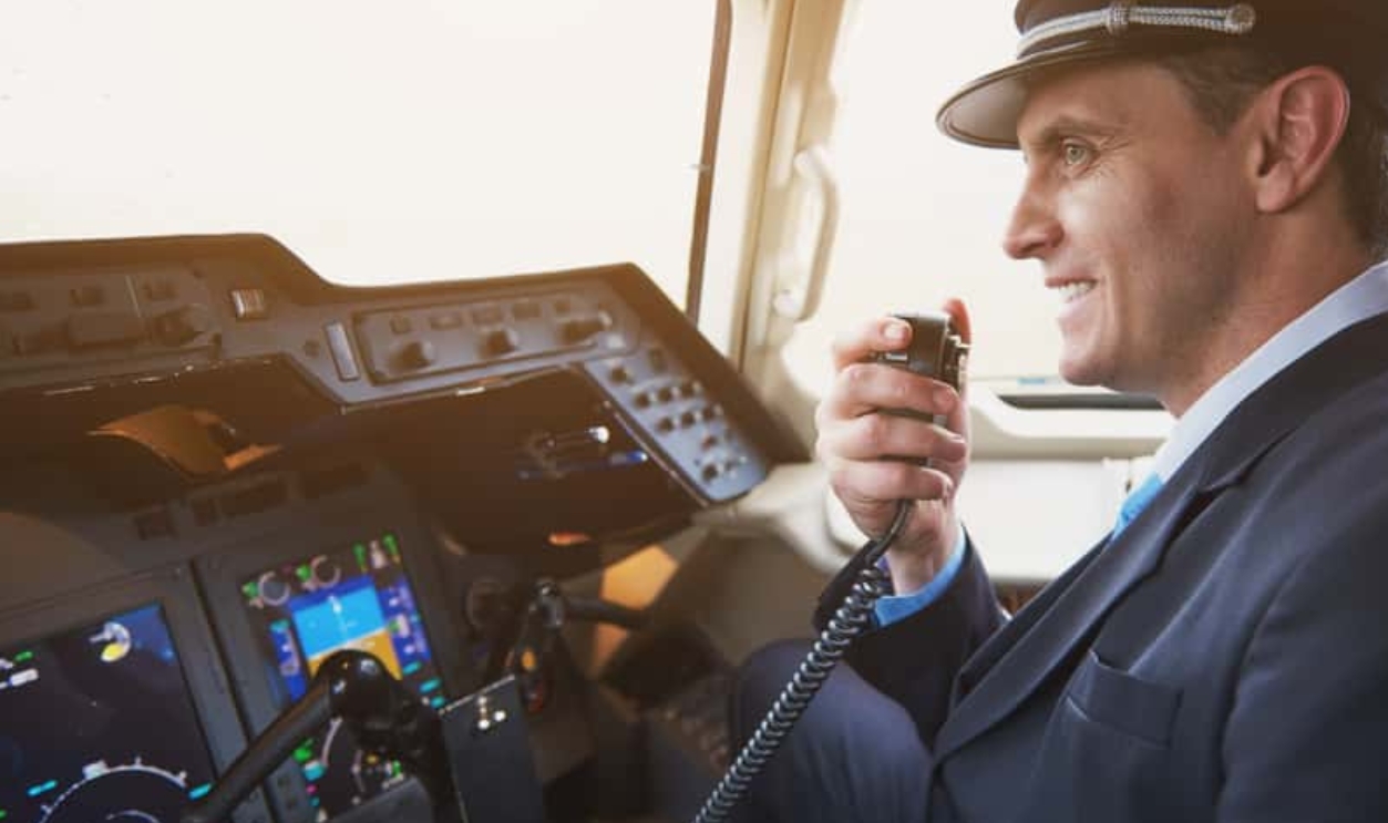 Side View Happy Pilot Talking, Shutterstock, 1033214245