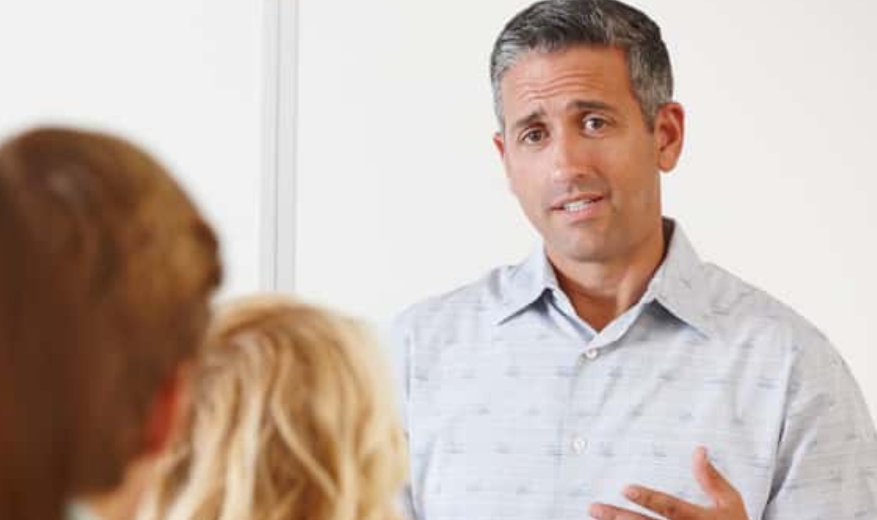 Tutor With Class Of Students, Shutterstock, 84249019