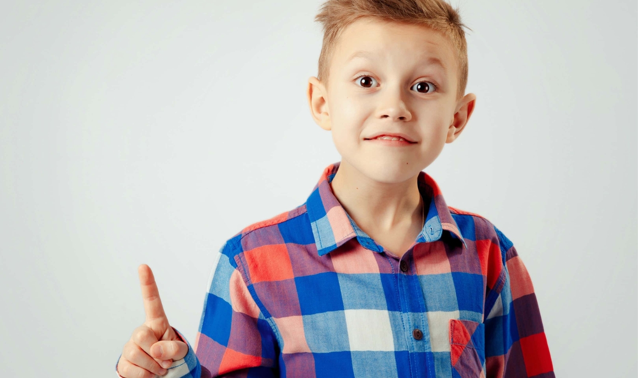 Boy Wearing Colorful Plaid Shirt, Shutterstock, 401437555