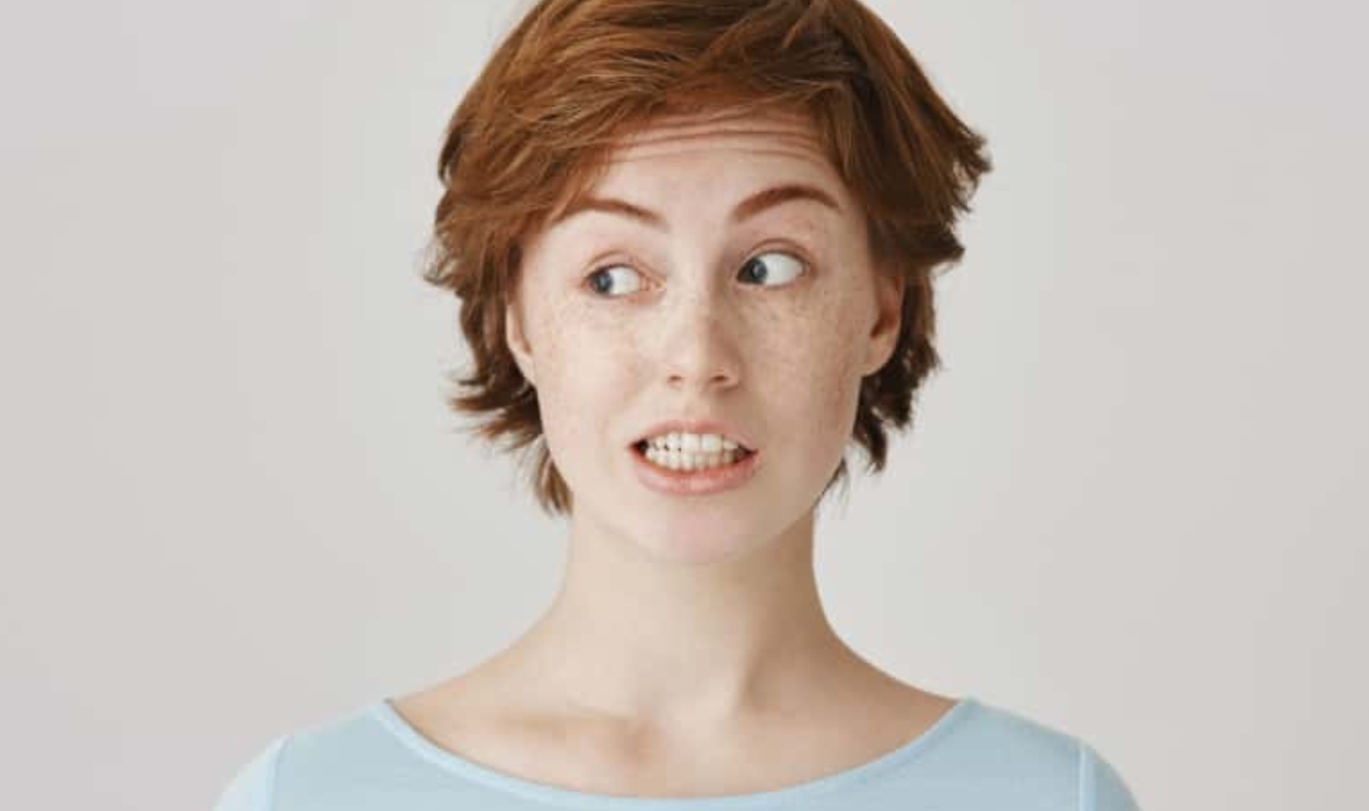 Confused Attractive Redhead Female, Shutterstock, 1149931715