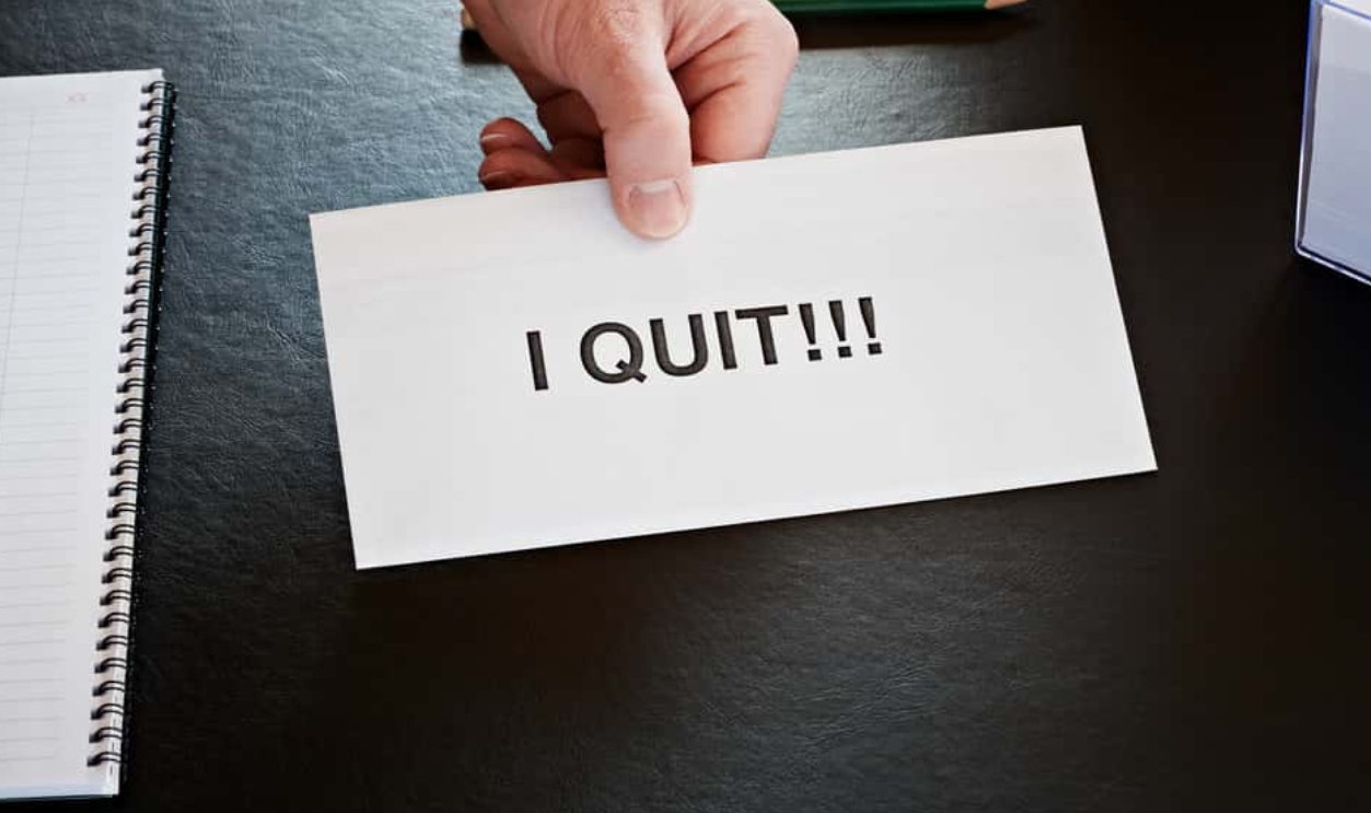 Hand Holding Resignation Letter, Shutterstock, 70617421