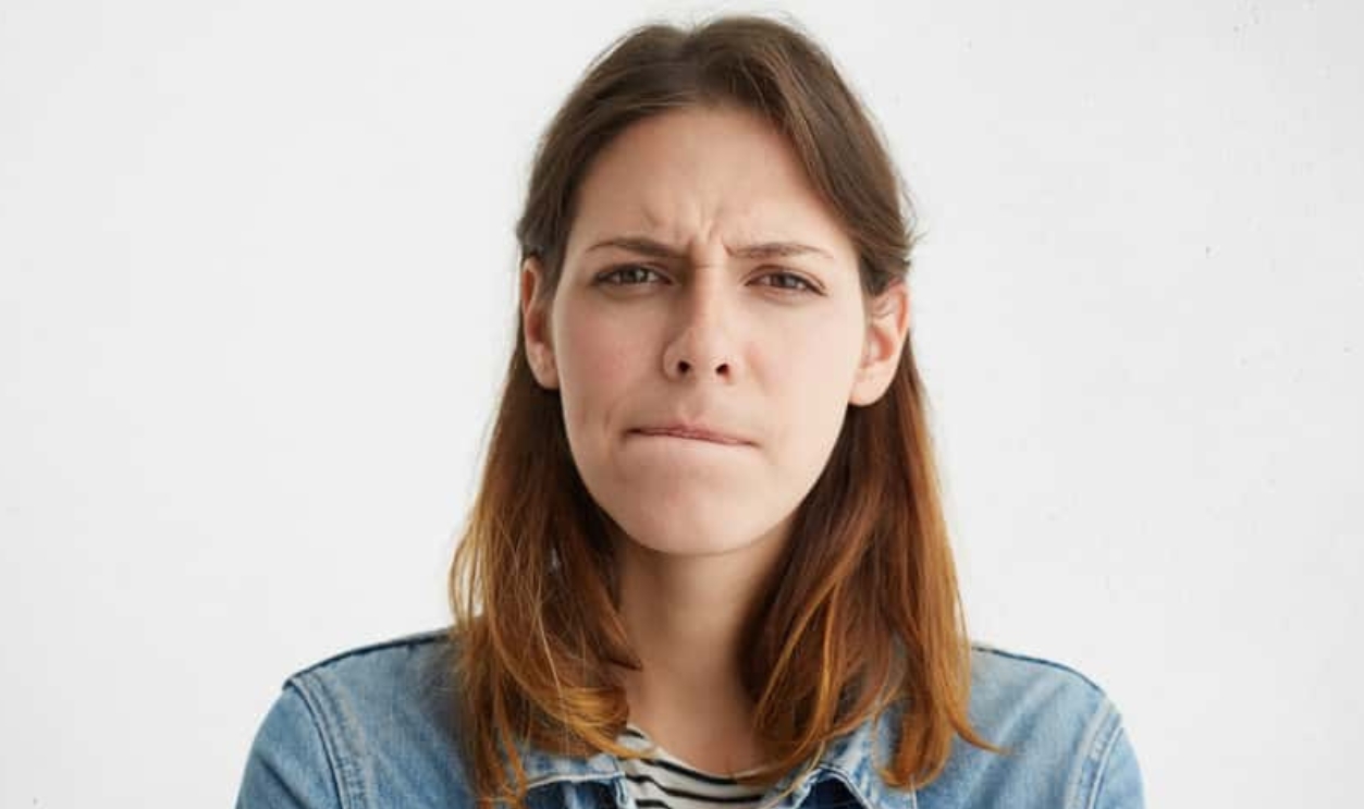 Headshot Of Indecisive Confused Young European Woman I, Shutterstock, 653360059