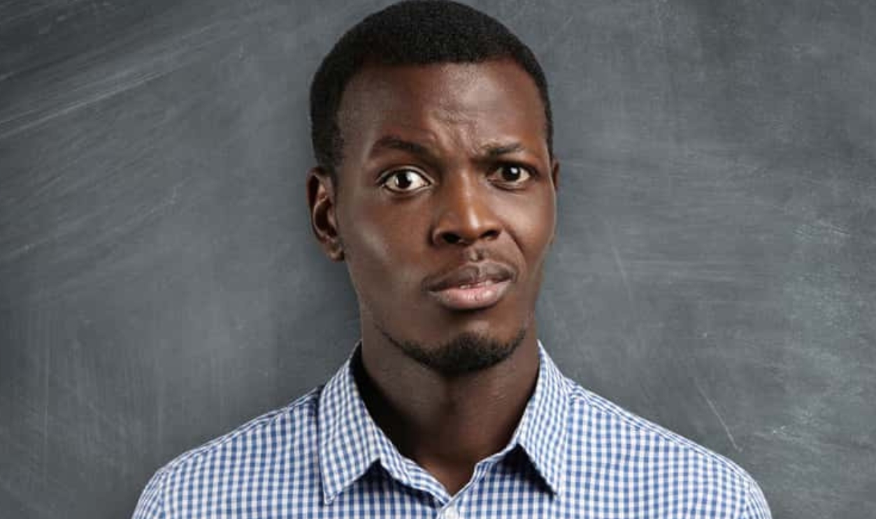 Shocked Dark-Skinned Teacher, Shutterstock, 499471111