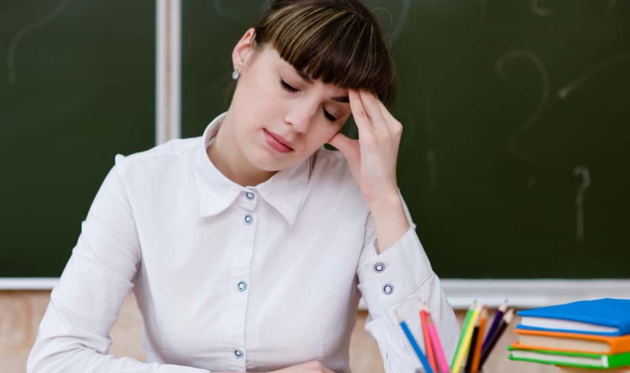 Tired Teacher In Classroom, Shutterstock, 152334629