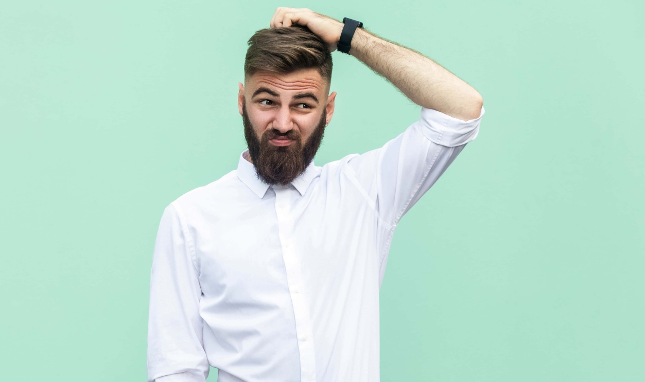 Young Adult Businessman Have A Doubt, Shutterstock, 700370347