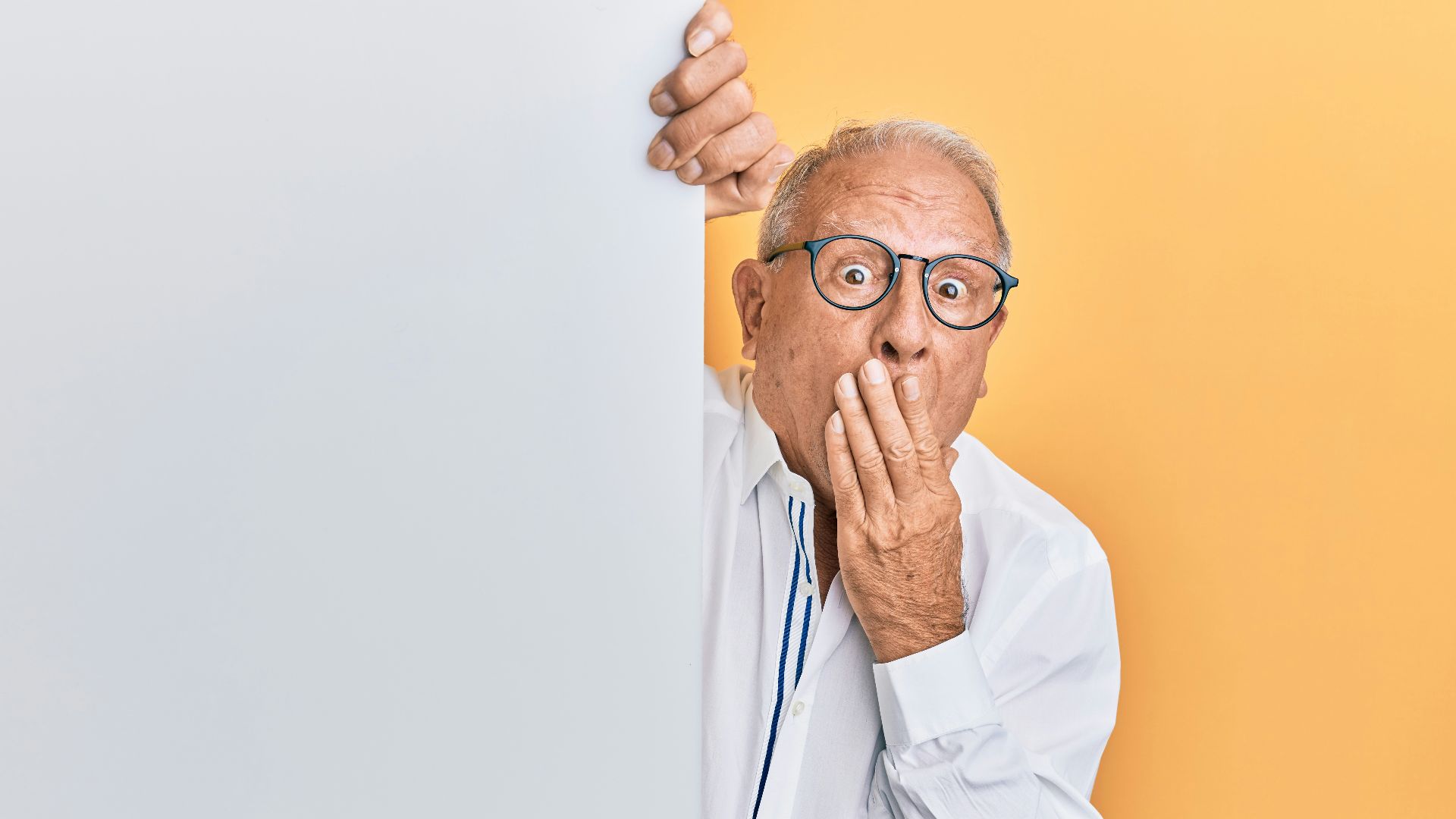 man in white dress shirt wearing black framed eyeglasses