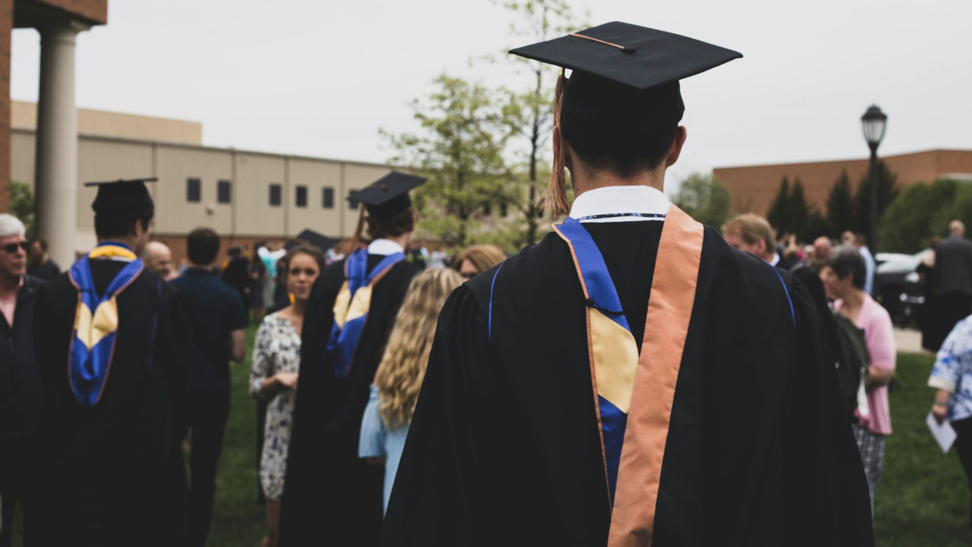 man wearing academic gown