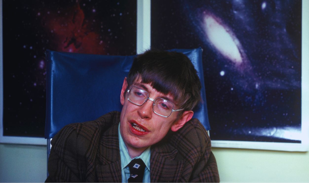 Gettyimages - 80066696, Stephen Hawking British theoretical physicist Professor Stephen Hawking in his office at the Department of Applied Mathematics and Theoretical Physics at the University of Cambridge, circa 1990. 