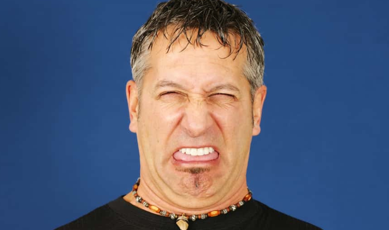 Man With Funny Disgusted Face, Shutterstock, 153780368