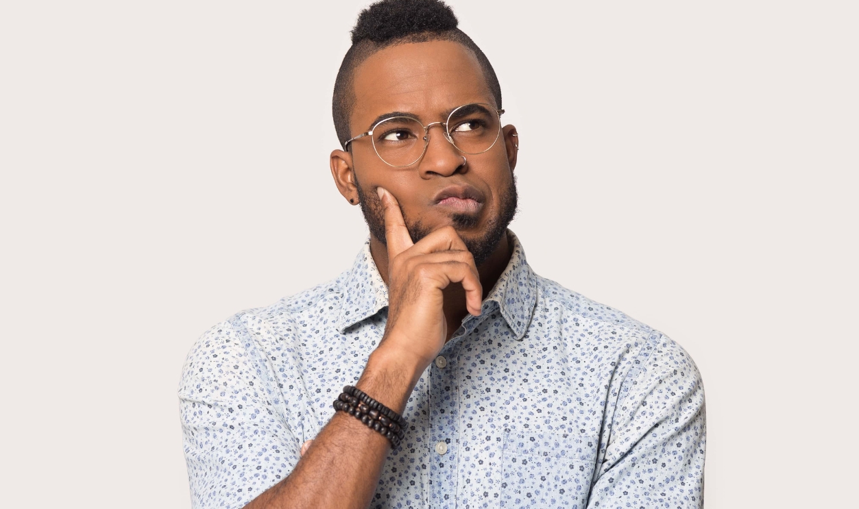 Thoughtful African Guy, Shutterstock, 1414586843