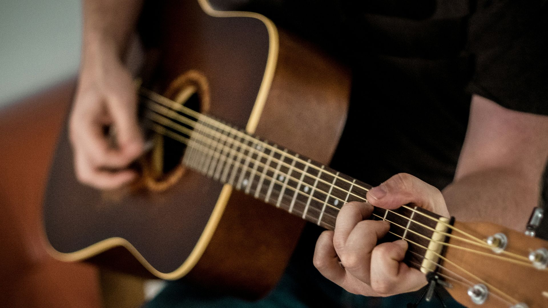 person playing guitar