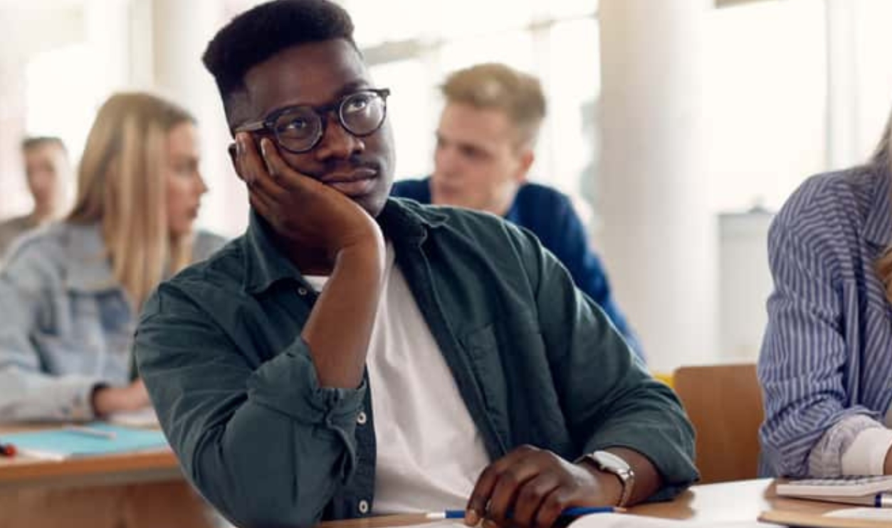 Bored Black Student Sitting At University, Shutterstock, 1937731474