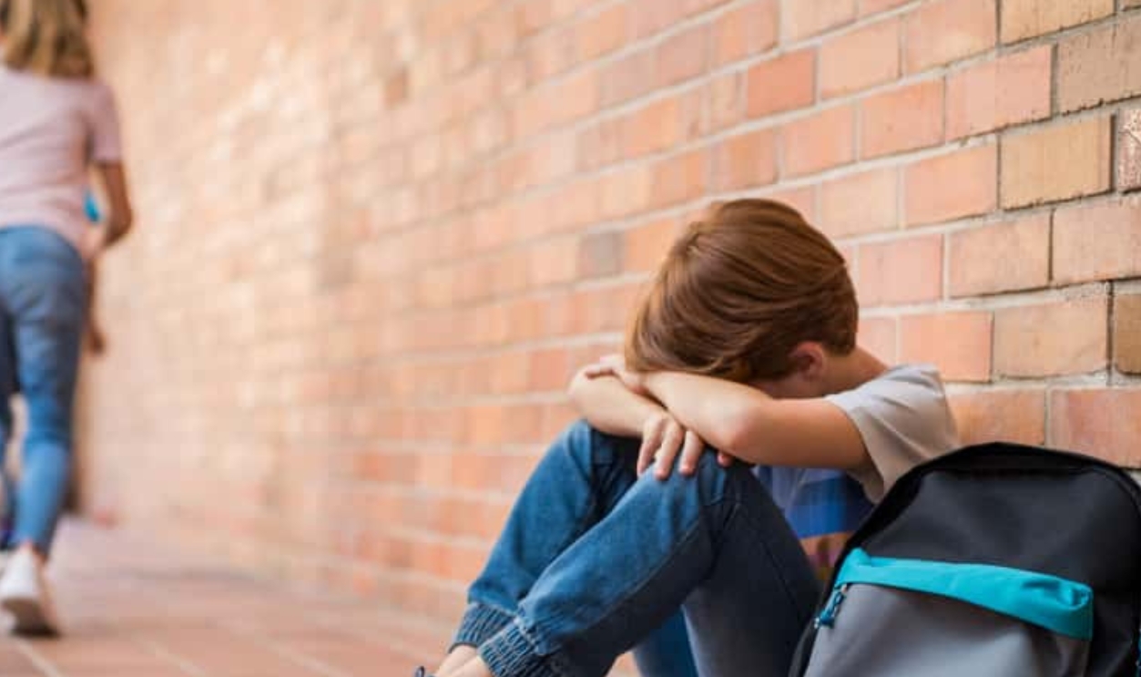 Little Boy Sitting Alone, Shutterstock, 1136889179