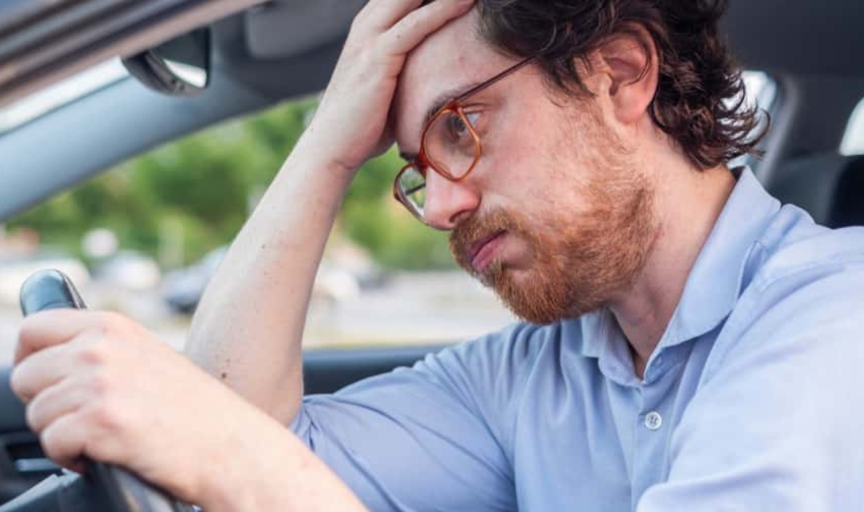 Man Driving Car Despair After Car Accident, Shutterstock, 1469234030