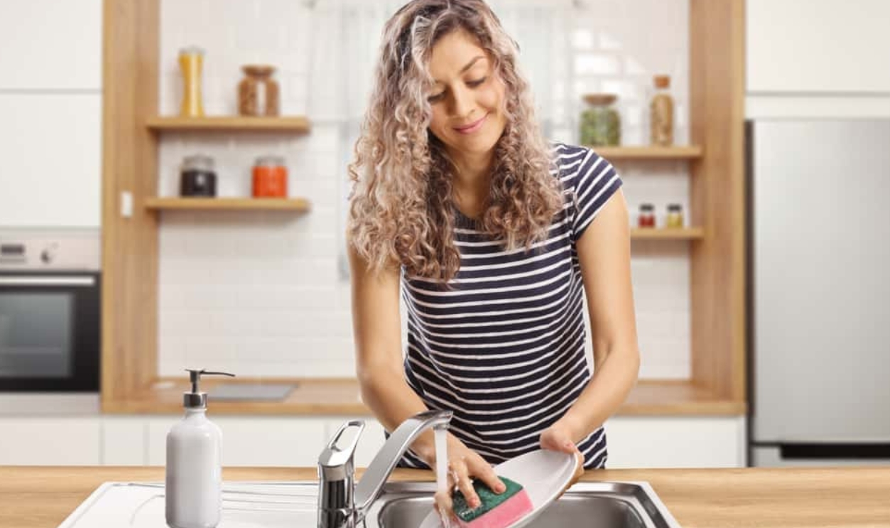 Woman Washing Dishes, Shutterstock, 1773260876
