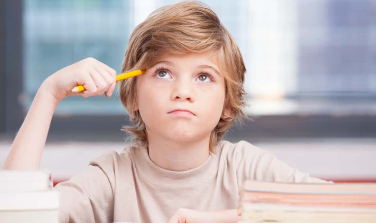 Boy Trying To Find New Ideas For Schoolwork, Shutterstock, 247312825