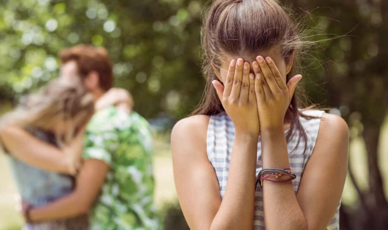 Brunette Upset At Seeing Boyfriend With Other Girl , Shutterstock, 256183993
