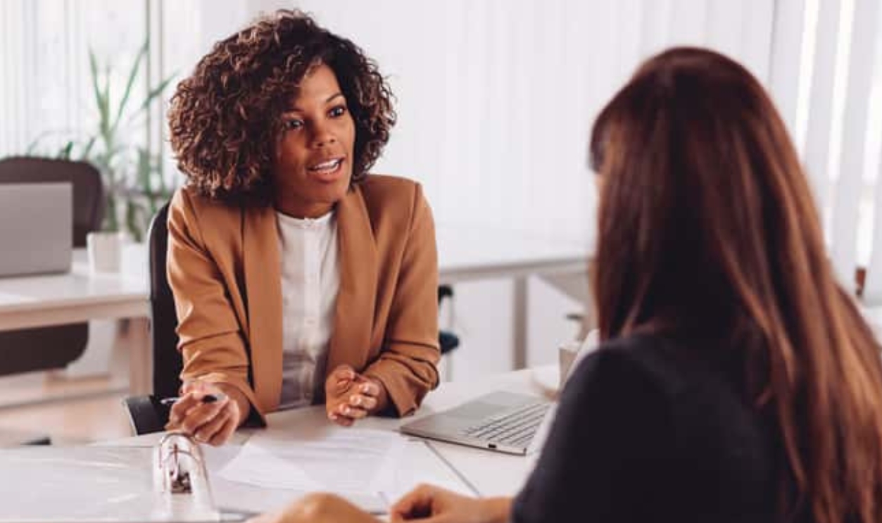 Consulting With A Financial Manager , Shutterstock, 1702865884