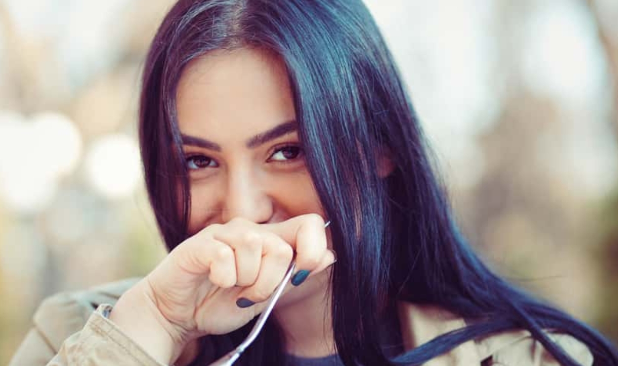 Woman Smiling Eating, Shutterstock, 709662046