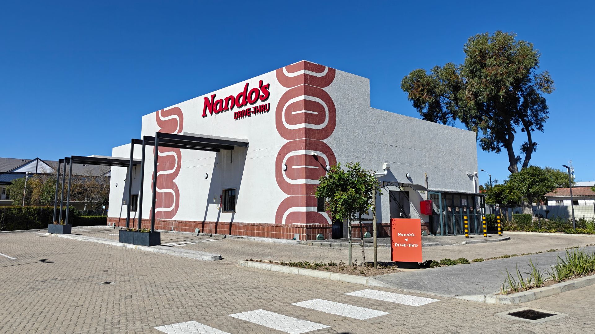 File:Nando's outlet at the 3Arts Village shopping center in Plumstead, Cape Town.jpg
