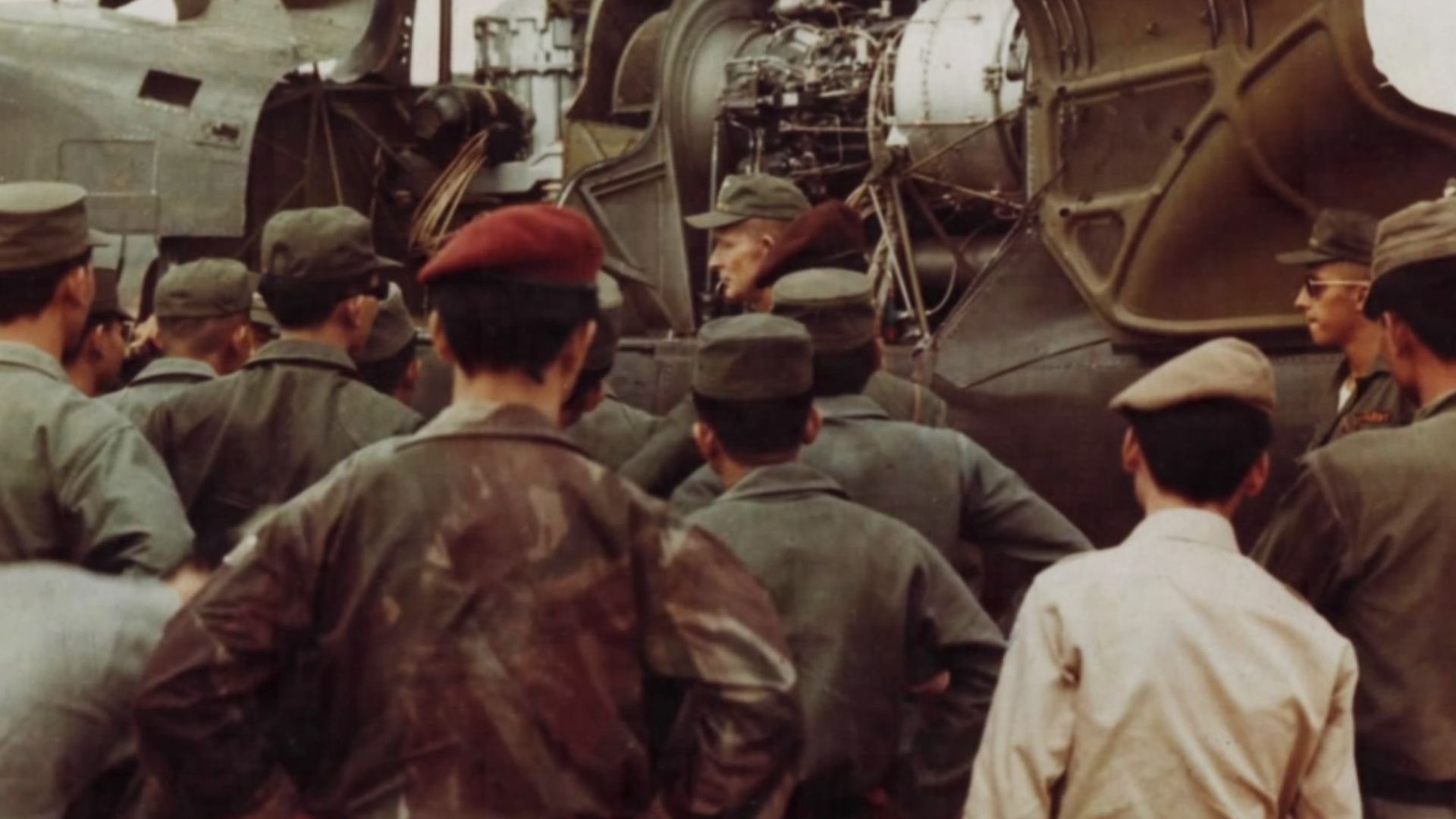 File:US officer explains the HU-1A helicopter to Vietnamese officers at Thu Duc.jpg