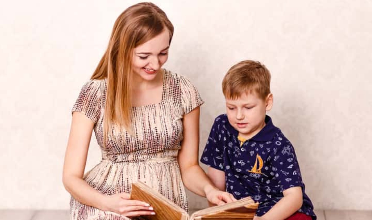 Mother And Seven-Year-Old Son Are Watching A Photo, Shutterstock, 1331391242