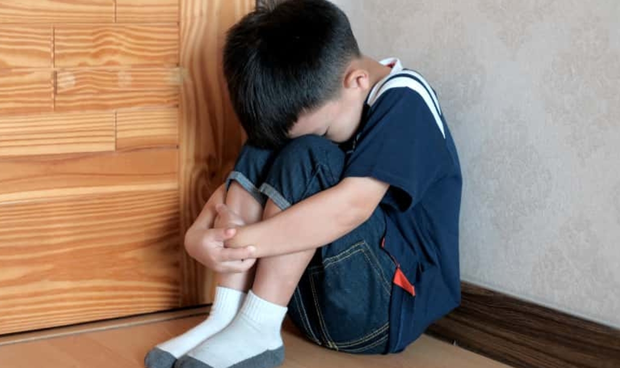 A Sad Boy Is Sitting In The Room Corner Alone, Shutterstock, 1150801490