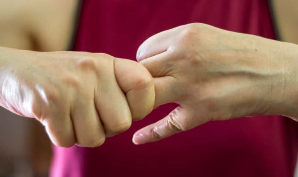 Older Woman Cracking Their Knuckles, Shutterstock, 1124065523 (2)