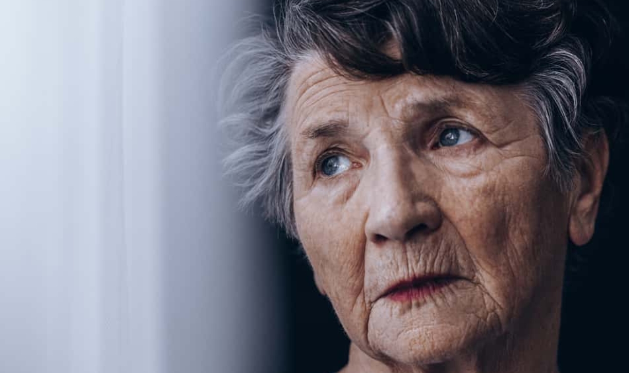 Portrait Of Despair, Old Woman Standing Beside Window, Shutterstock, 628433555