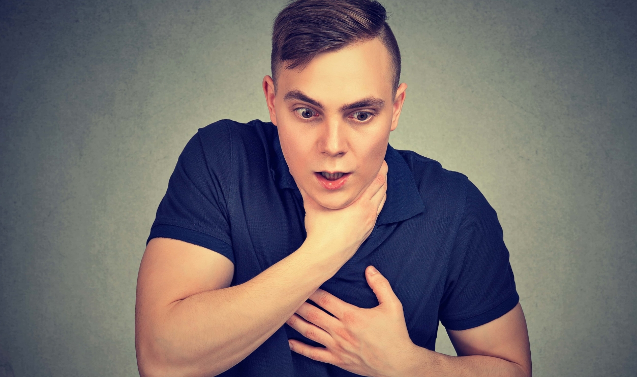 Young Man Having Asthma Attack, Shutterstock, 645233320