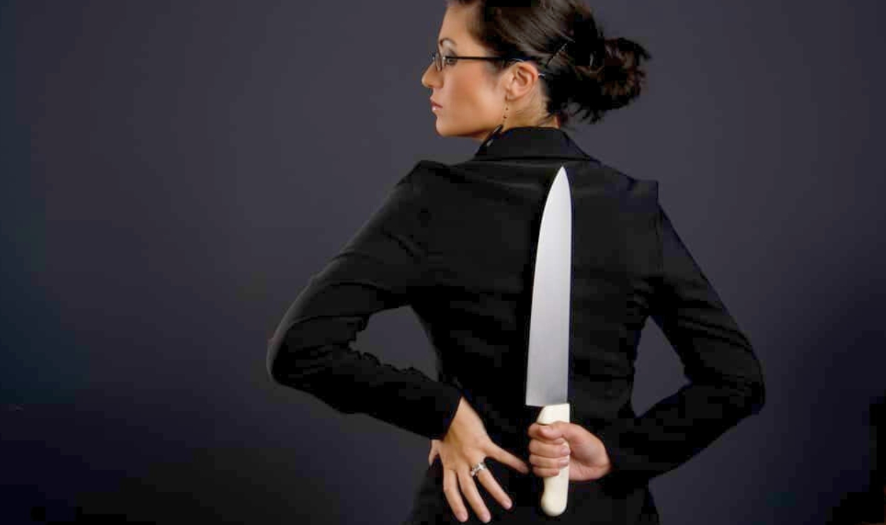 Back Stabber Professional Woman, Shutterstock, 86758156