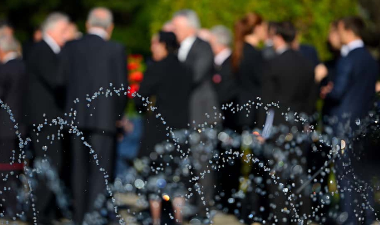 Blurred People In Black Suits On Funeral, Shutterstock, 693236581