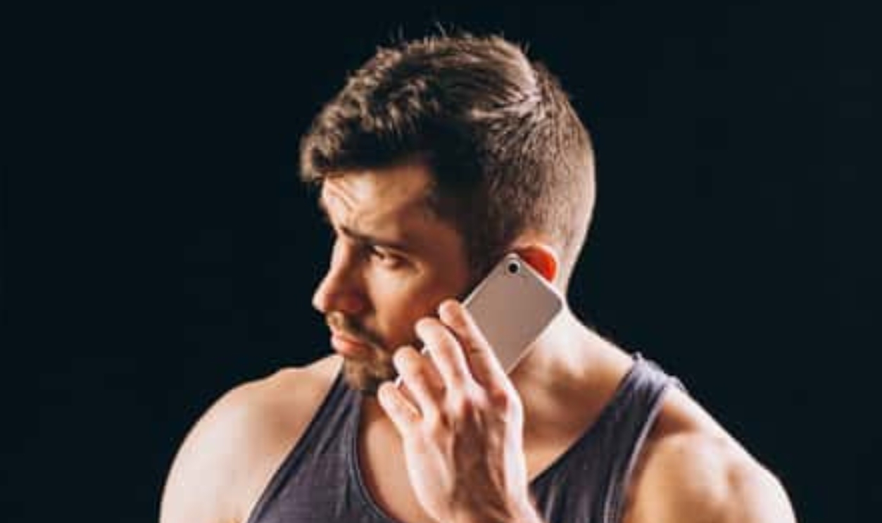 Fit Man Talking On The Phone, Shutterstock, 1502428382