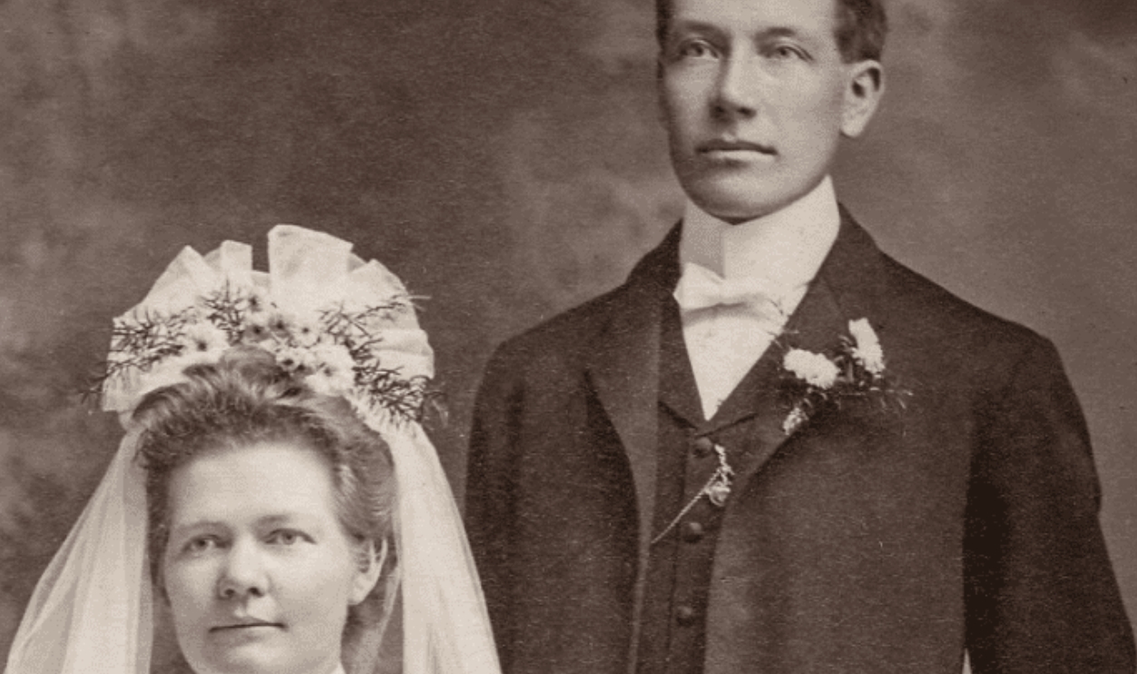Woman Wearing Wedding Gown Beside Man Wearing Suit