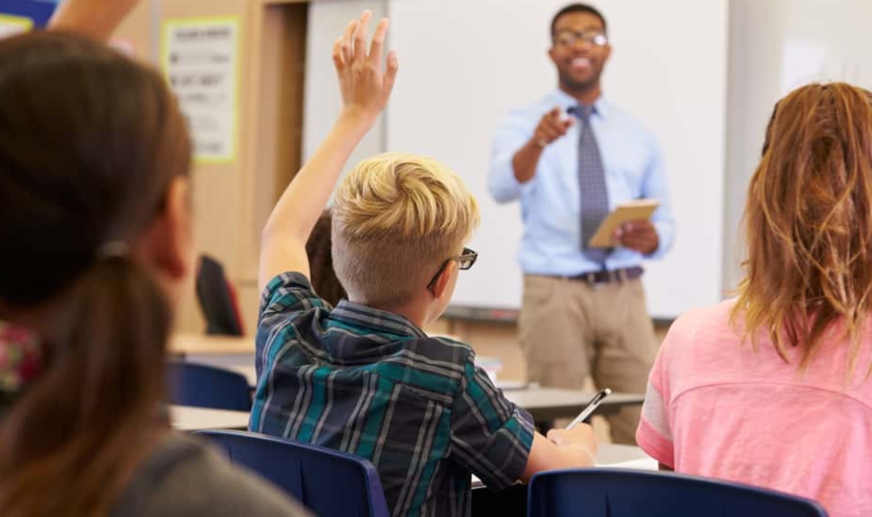 Kids Raising Hands To Answer In An Elementary, Shutterstock, 388667935