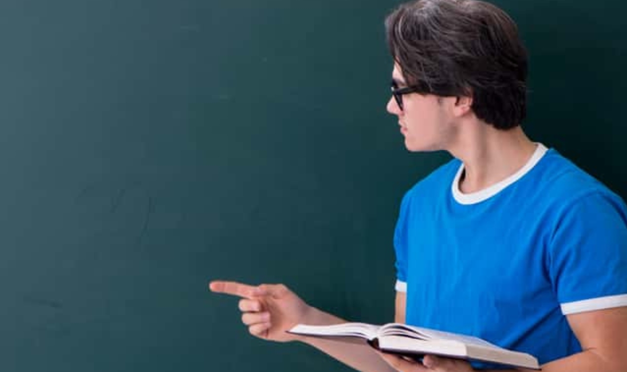 Young Male Student In The Classroom , Shutterstock, 1464158870