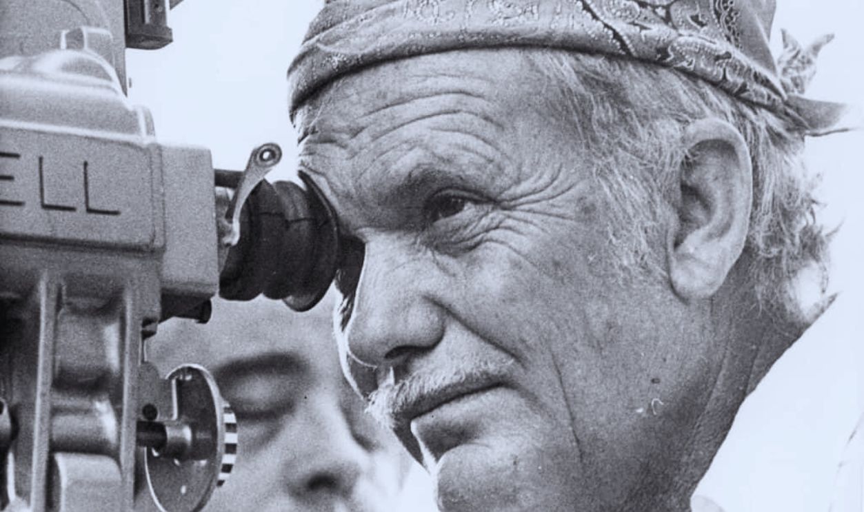 Gettyimages - 2641573, Sam Peckinpah American film director Sam Peckinpah (1925 - 1985) looking through the camera lens whilst filming 'Cross of Iron'. 