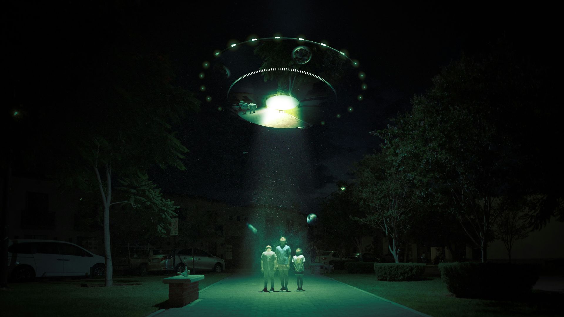 a group of people standing in front of a lighted archway